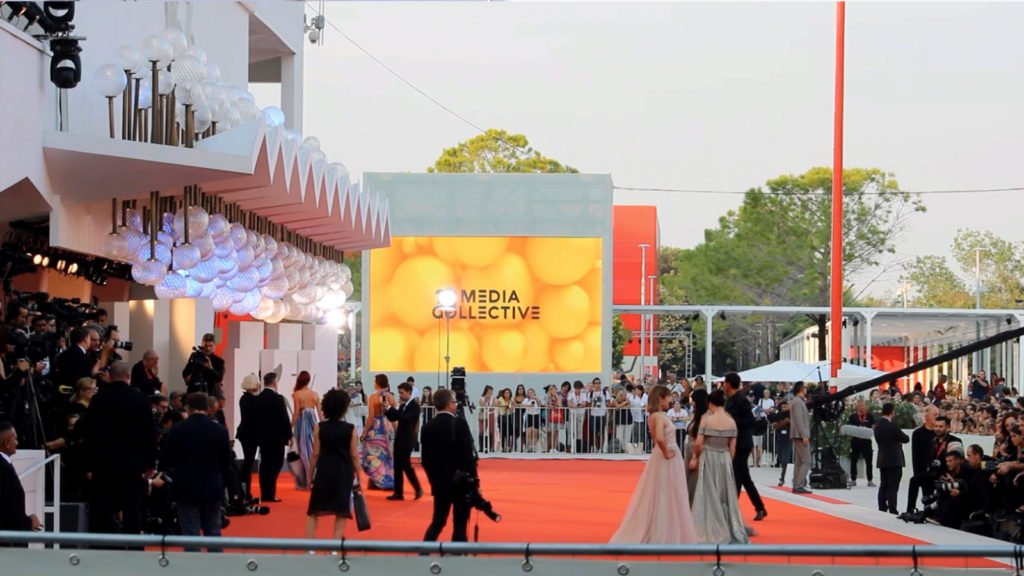 Screen Content:  Live feed, official red carpet footage, SACO Media Collective content